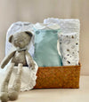 Elegant unisex baby gift hamper in soft neutral tones. Ideal for baby showers or corporate gifts. Delivered to hospital or home with free UAE shipping.